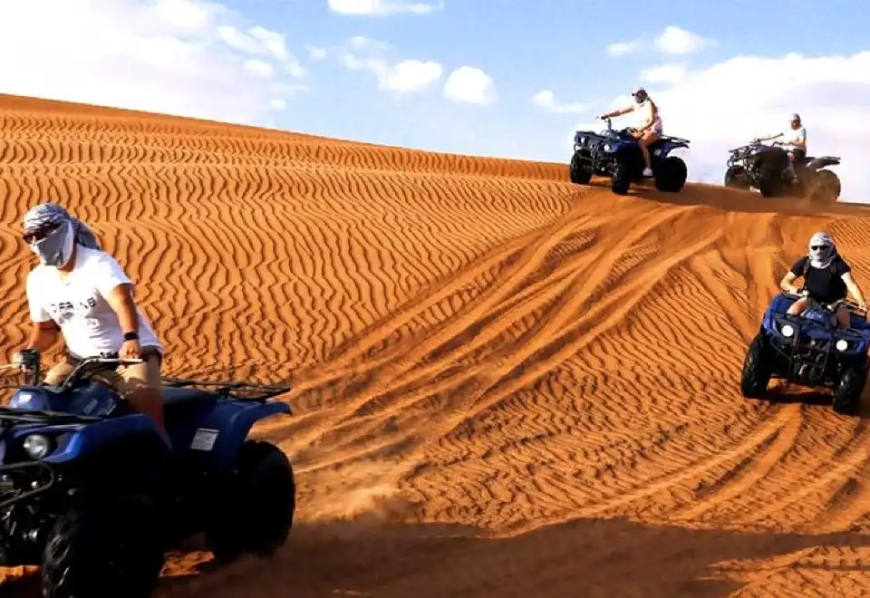 Can-Am Ride Across Dubai Desert Landscape Can-Am Ride Across Dubai Desert Landscape