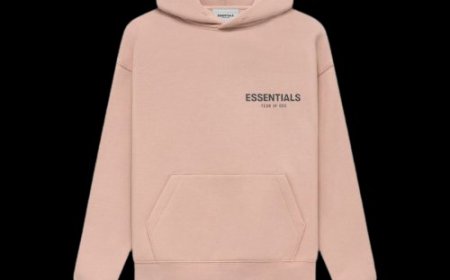 Get Cozy in style with the Pink Essentials Hoodie
